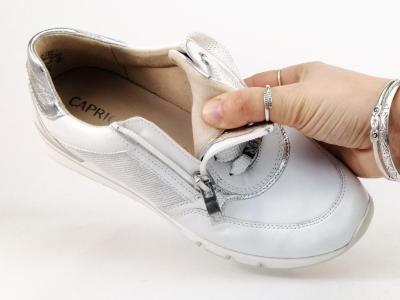 Chaussure femme pied large basket chic et confortable en cuir blanc CAPRICE 23725 largeur H